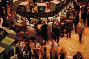 Face-to-face trading interactions on the New York Stock Exchange trading floor.   Financial decisions can be one of those many economic choices people make.